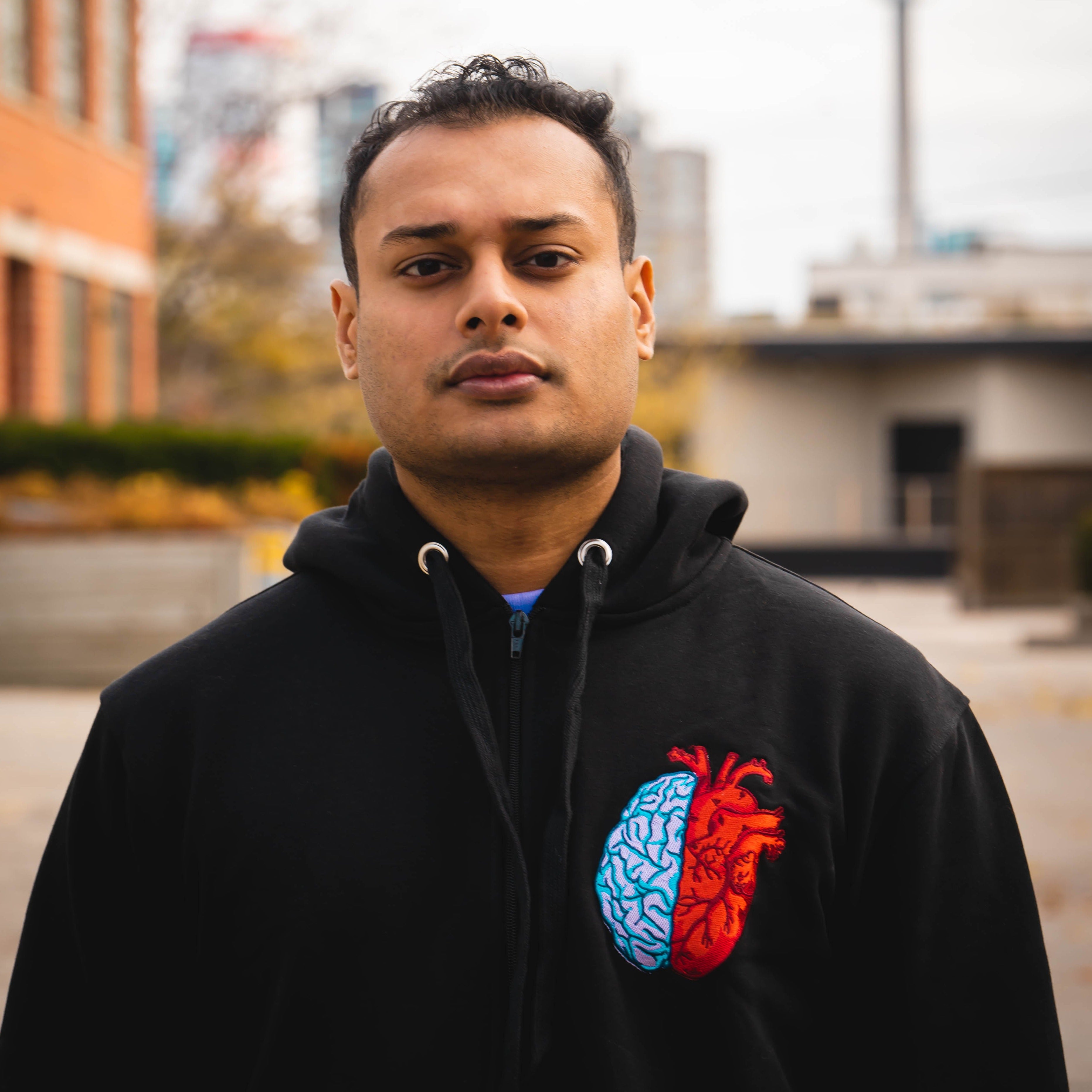 Model Wearing Black Hoodie